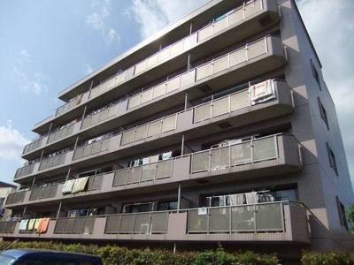 Building appearance. Balcony surface yang per good for parking