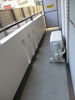 Balcony. The photograph is a first floor balcony. There is no blindfold on the second floor.