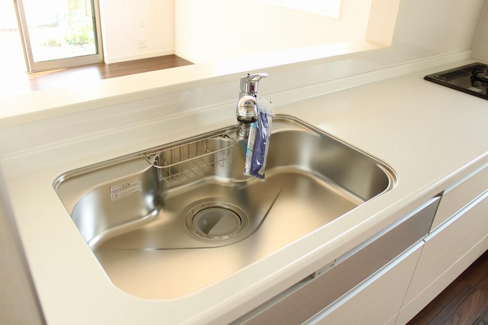 Kitchen. Seller construction cases. Large sink and cooking space.