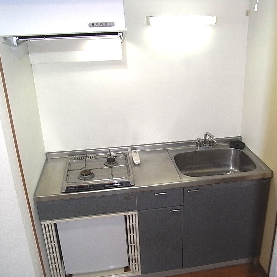 Kitchen. Gas two-burner stove with system Kitchen, With mini fridge