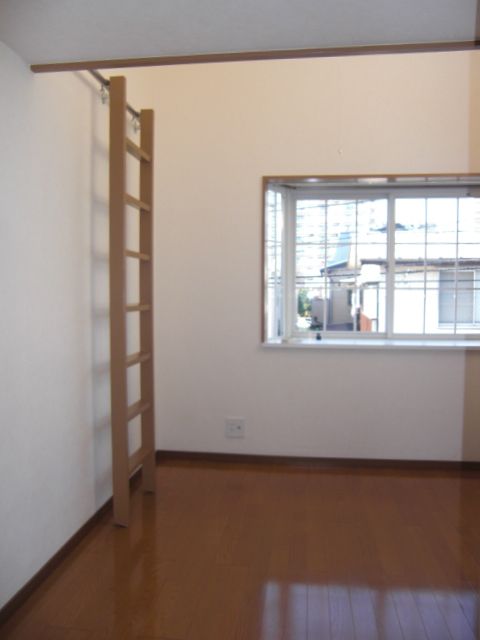 Living and room. Ladder can be stored on the wall. Do not take the width.