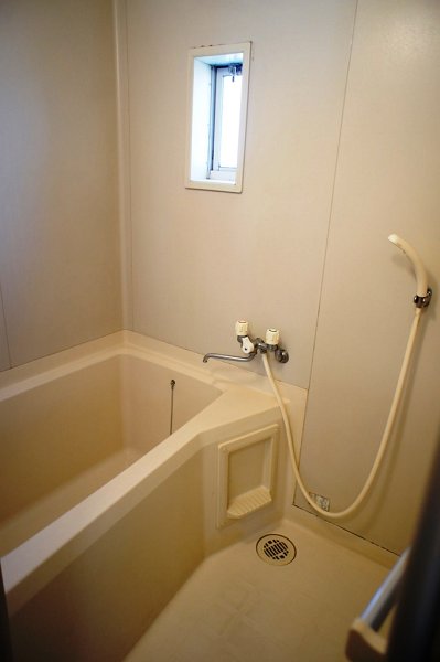 Bath.  ☆ It is a bathroom with a small window