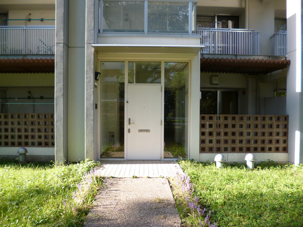 Entrance. Surrounded by green Stylish entrance.