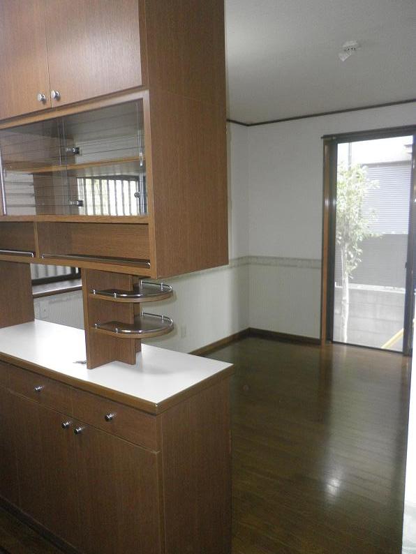Living and room. Cupboard with dining kitchen
