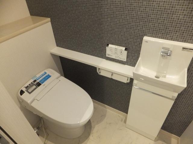 Toilet. INAX Corp. tankless toilet