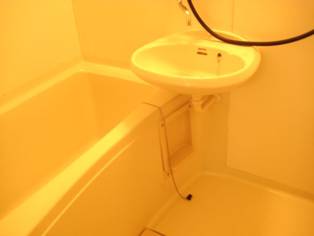 Bath. Bathroom was a white tones