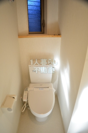 Living and room. It is with a bidet. Also it comes with a window