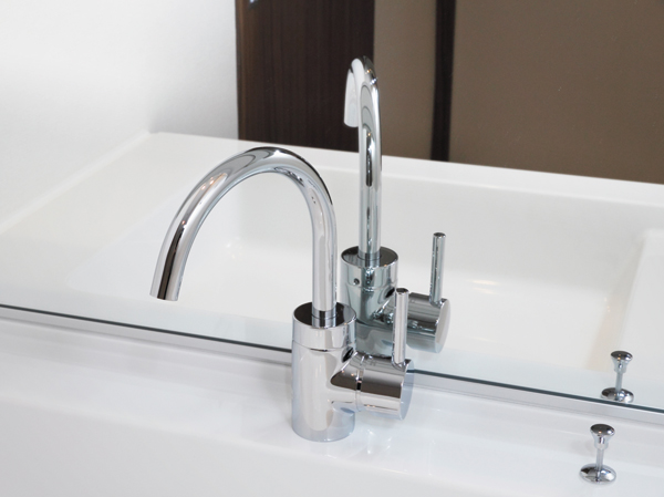 Bathing-wash room.  [Mono style swan-neck single-lever faucet] Graceful swan-neck form, I served with elegance in space.