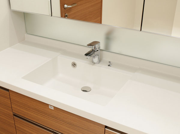Bathing-wash room.  [Counter-integrated bowl] The vanity is, Adopt a wash bowl which is integrally molded counter and bowl. Beautiful design seamless, A specification that smooth texture strike a fine of.