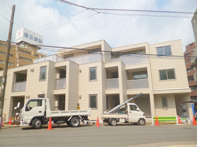 Building appearance. April 2014 scheduled to be completed over to the Asahi Kasei Belle Maison