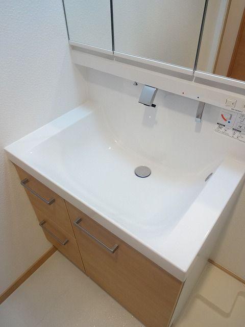 Wash basin, toilet. Bathroom vanity