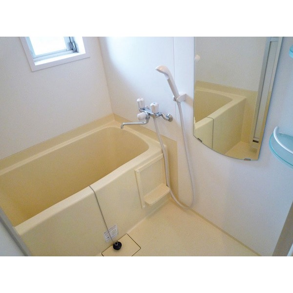 Bath. Full-length mirror with bathroom