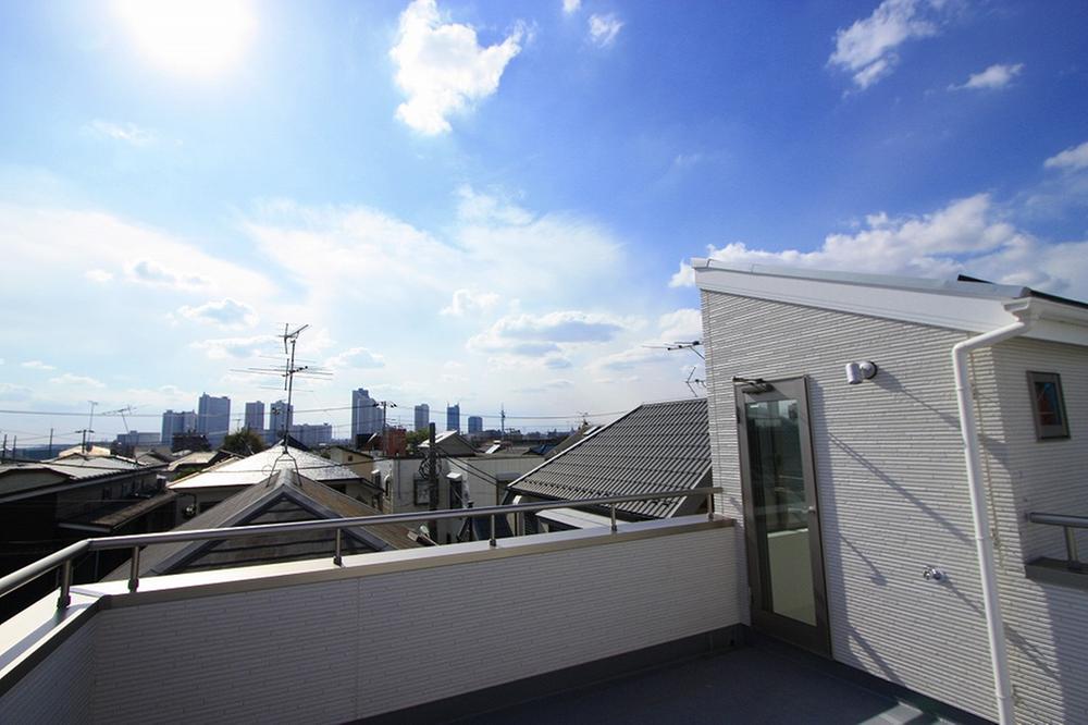Balcony. The view from the roof balcony, Tower apartment looks of Musashi Kosugi. 