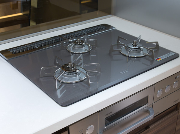 Kitchen.  [Glass top stove] Glass top stove of stylish and versatile function. Such as the adoption of one-touch ignition function and without water two-sided grill. Because the glass top is easy to clean.