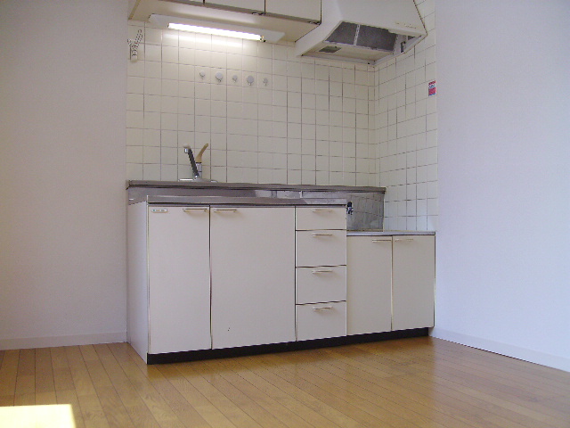 Kitchen. Same property, It is a photograph of another room