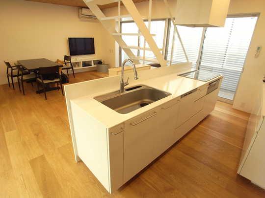 Kitchen. This island kitchen that can cook while watching the children playing in the living room.