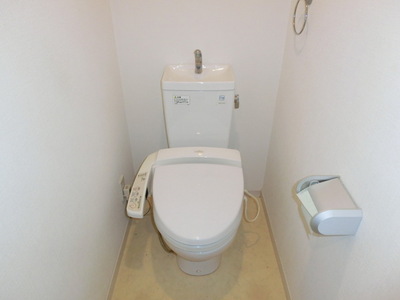 Toilet. Toilet is equipped with Washlet