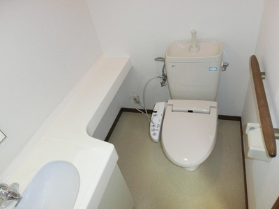 Toilet. It is a handy bidet type toilet with washroom