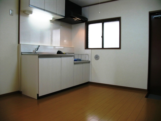 Living and room.  ■ There is a window in the kitchen