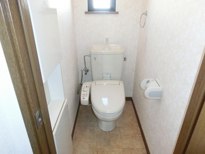 Toilet. Toilet is equipped with Washlet