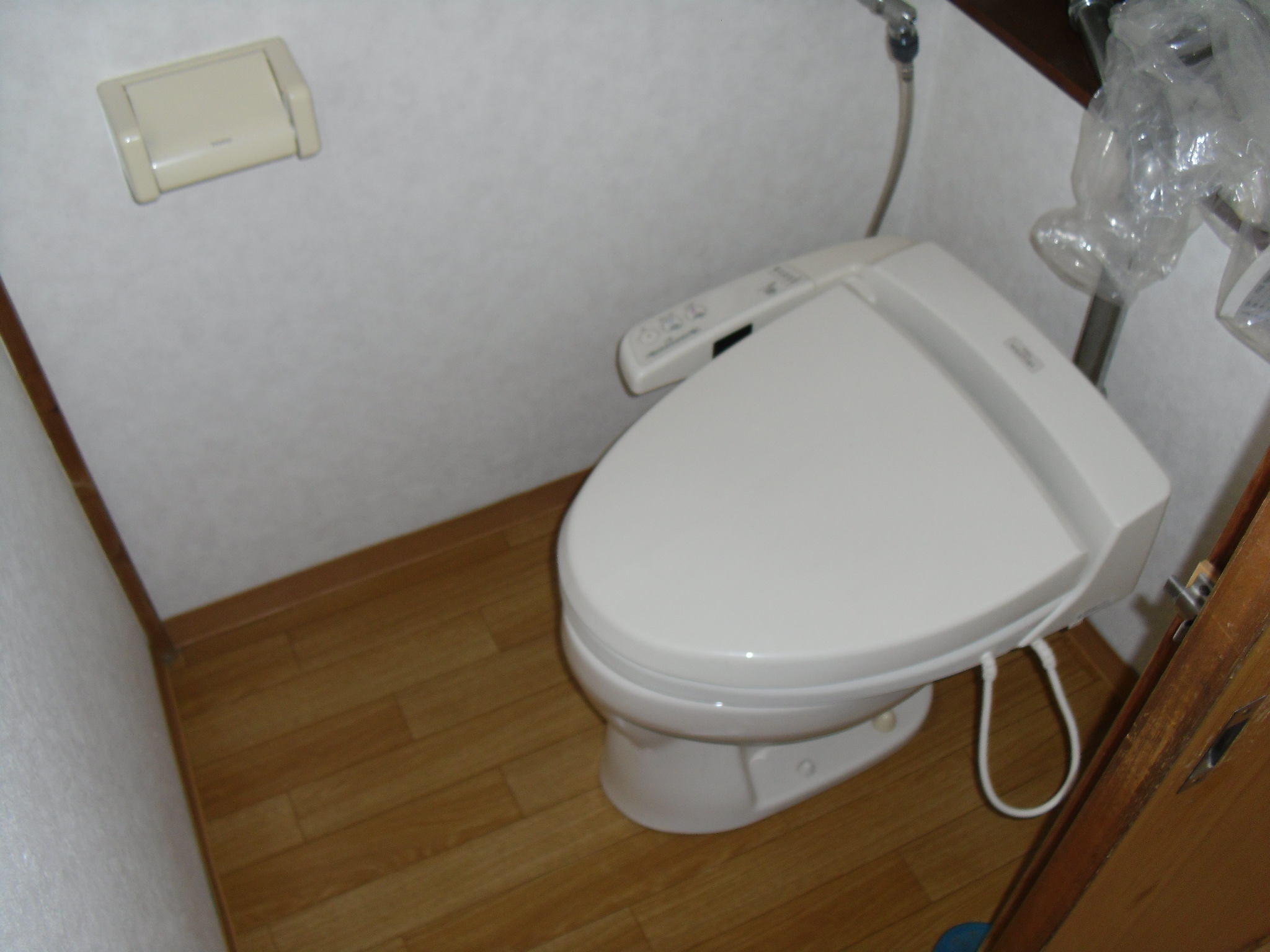 Toilet. Washlet is leaving product