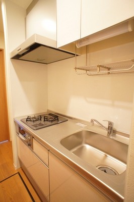 Kitchen. Stove installation completed system kitchen with grill ☆ Use because there is housed in the up and down