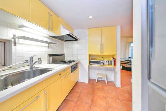 Spacious bright kitchen that was.