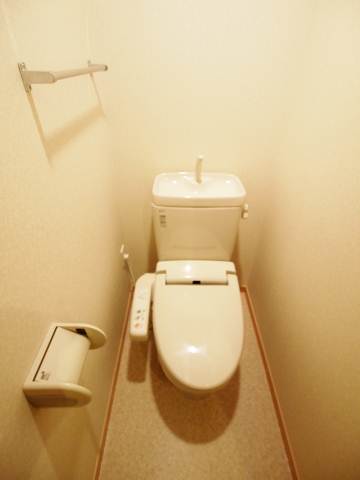 Toilet. Same property, It is a photograph of another room