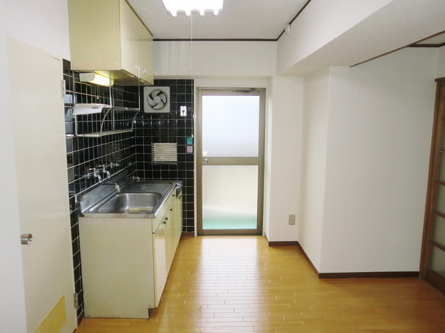 Other room space. There is a small balcony in the kitchen aside