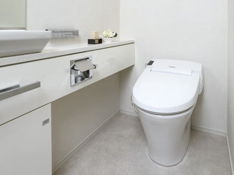 Bathing-wash room.  [toilet] Adopt a neat use water-saving tankless toilet space. Remote controller, Deodorizing ・ Heating function with warm water washing toilet seat, It has established a handwashing counter to produce a space of the room.
