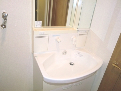 Washroom. Independent wash basin is also located convenient