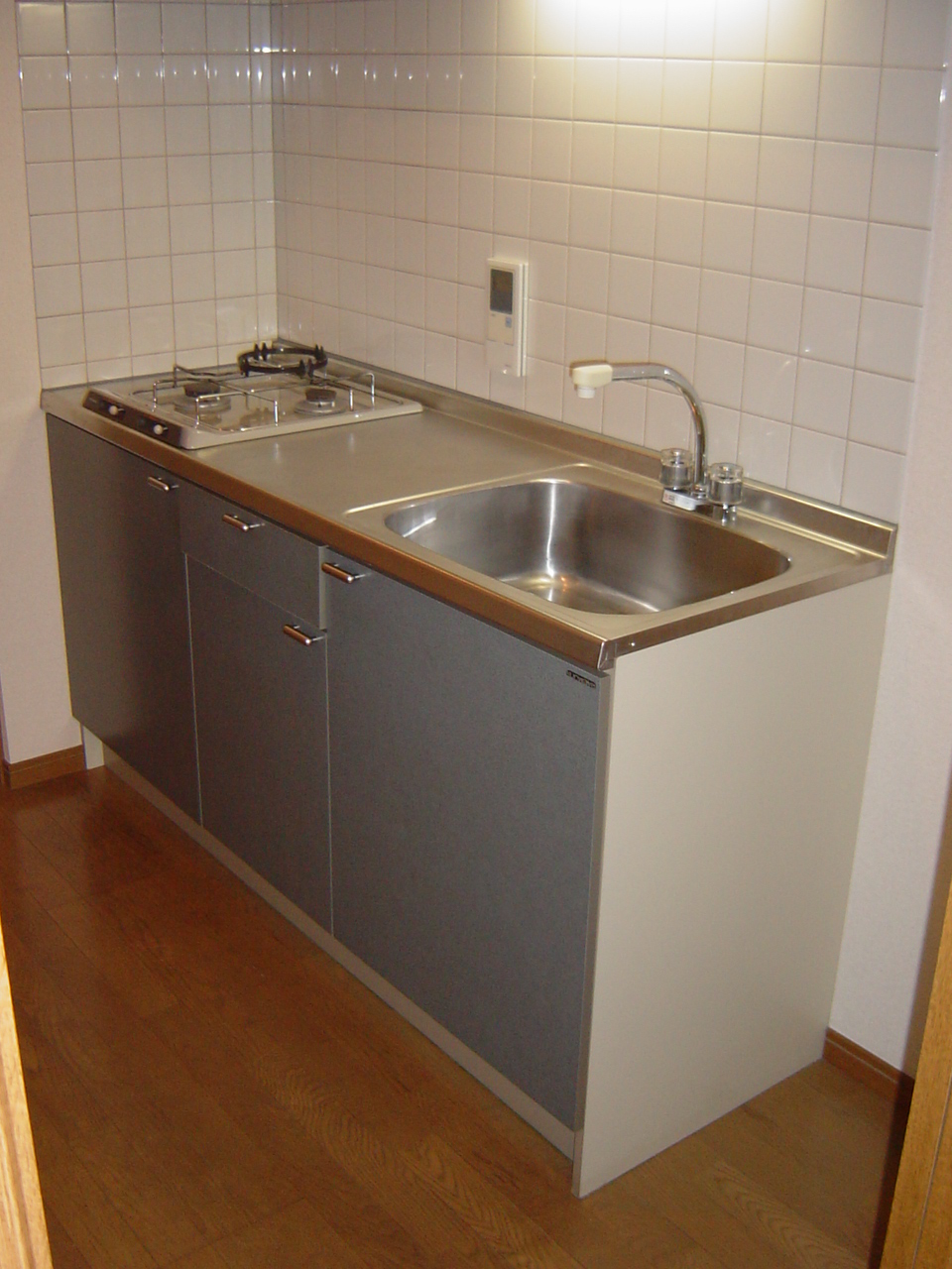 Kitchen. In addition to the two-burner stove, Large cutting board space