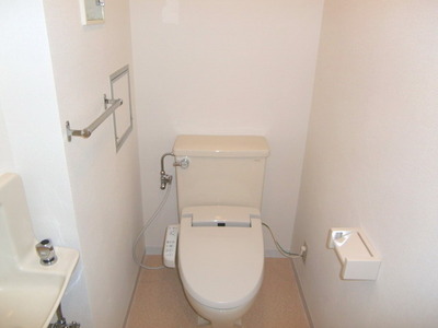 Toilet. Toilet is equipped with Washlet