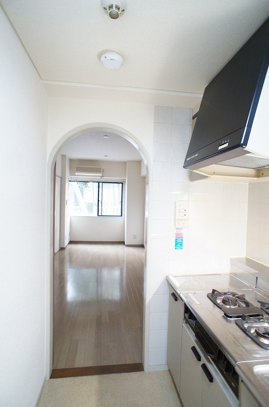 Kitchen. Is cute arched entrance following the living-dining from the kitchen