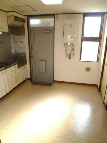 Other room space. Spread of kitchen