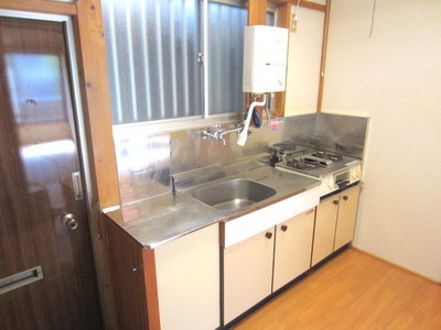 Kitchen. With instant water heater is in large kitchen