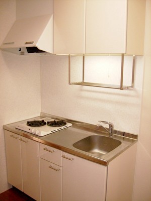 Kitchen.  ■ Gas two-burner system K