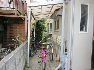 Entrance. There are bicycle parking lot with a roof