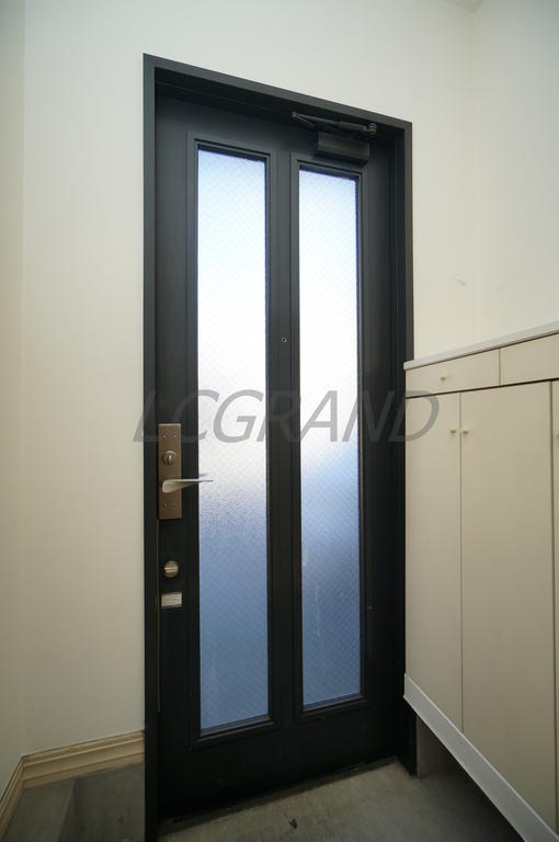 Entrance. Bright entrance with frosted glass. 