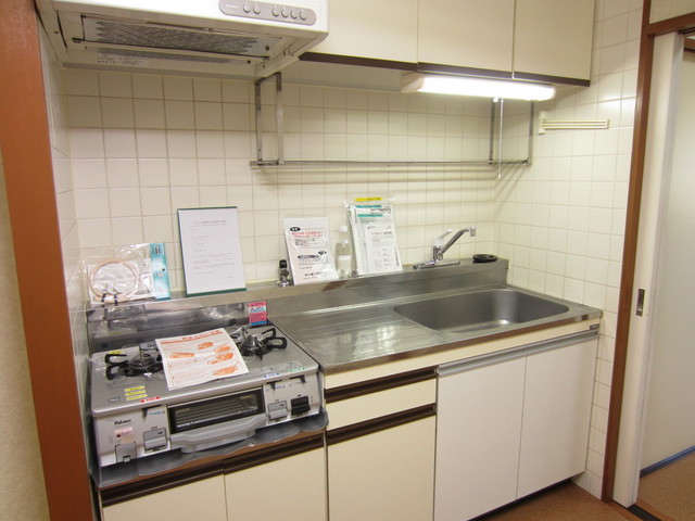 Kitchen. Gas stove is correspondence kitchen.