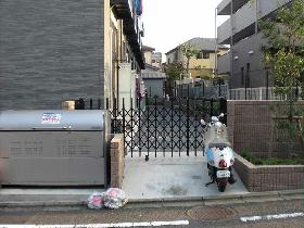 Other. First floor veranda side and trash storage