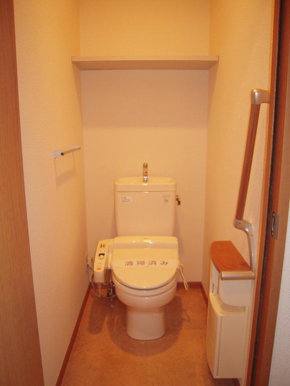 Toilet. Washlet type of toilet (with handrail).