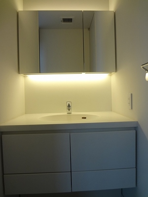 Washroom. Washstand of indirect lighting