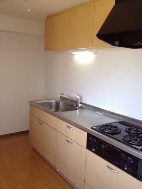 Kitchen. Bright because there is a bay window to the kitchen back side! 