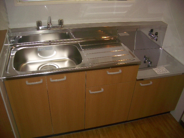 Kitchen. A spacious kitchen! There is also a lighting!