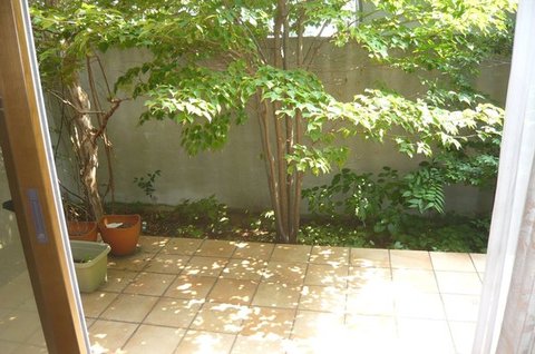 Garden. First floor dining front of the terrace Trees and garden