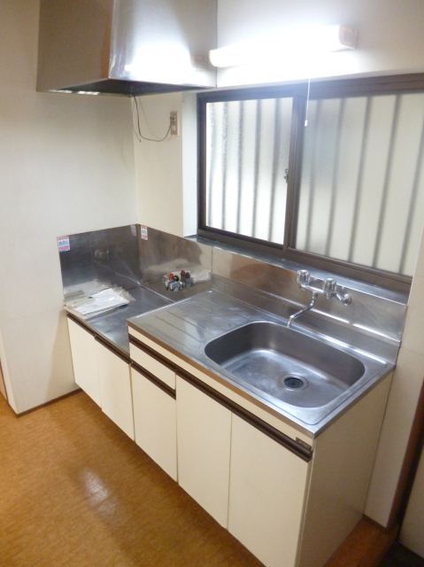 Kitchen. Two-burner stove can be installed in the kitchen space enhancement