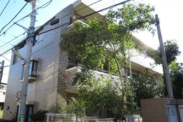 Local appearance photo. Exterior tiled low-rise apartment