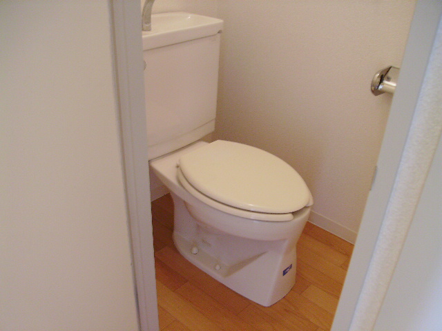 Toilet. Same property, It is a photograph of another room