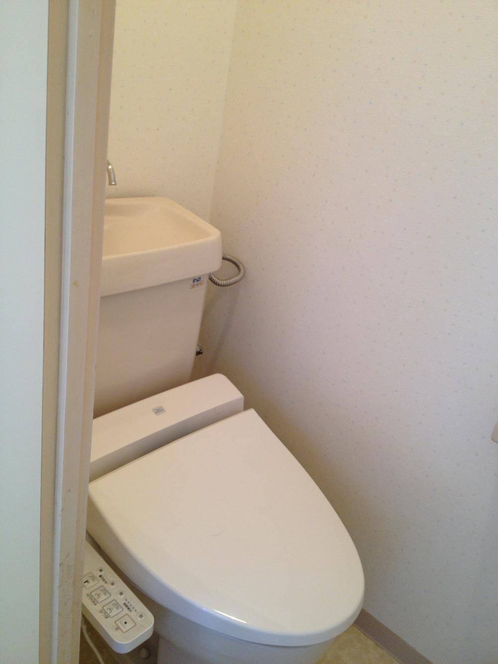 Toilet. With warm water washing toilet seat